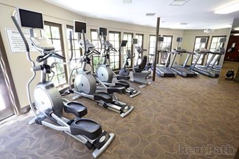 State-of-the-art fitness center with yoga room